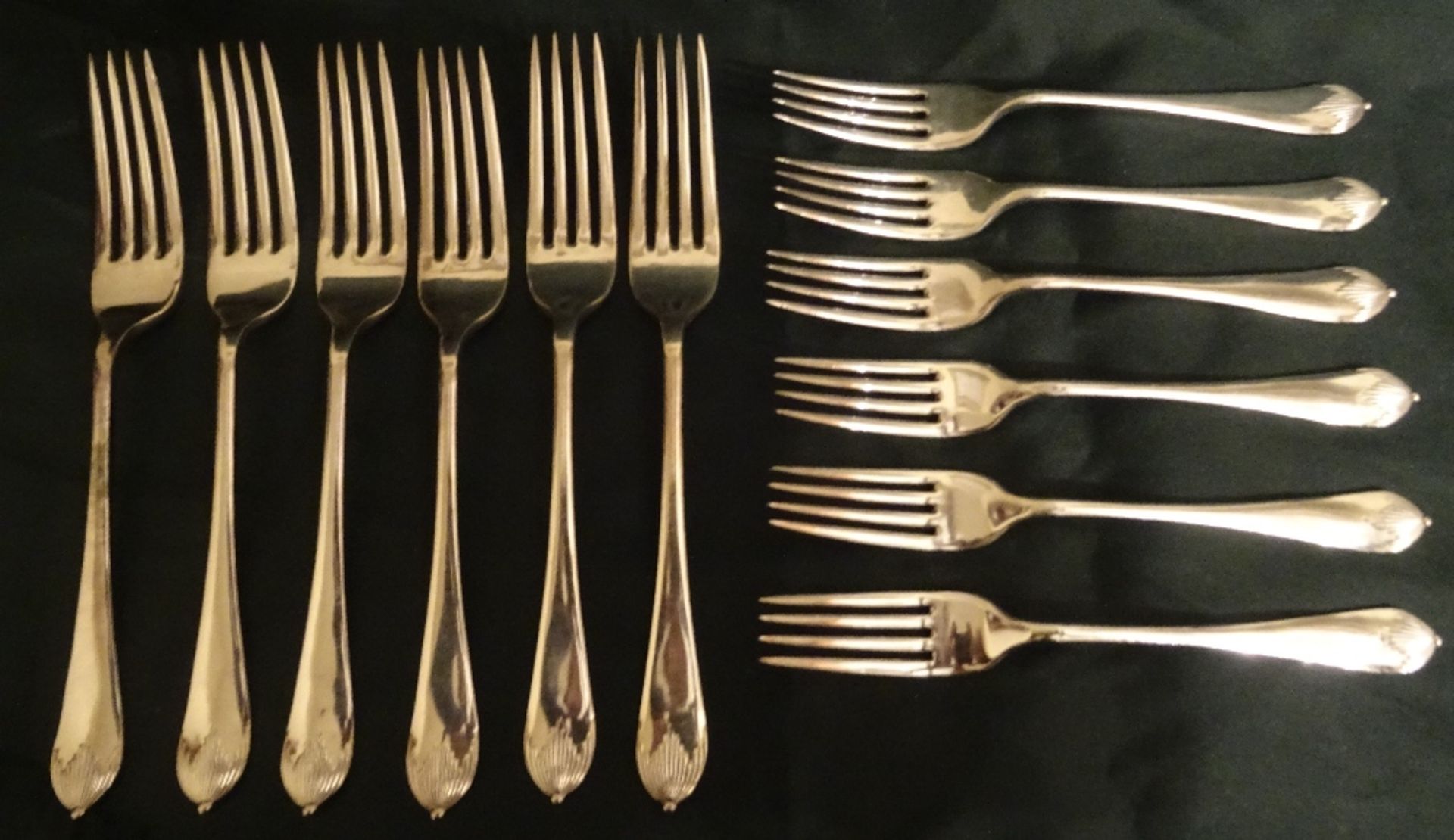 SIX SILVER PLATED TABLE FORKS AND SIX SILVER PLATED DESSERT FORKS [DECO STYLE]