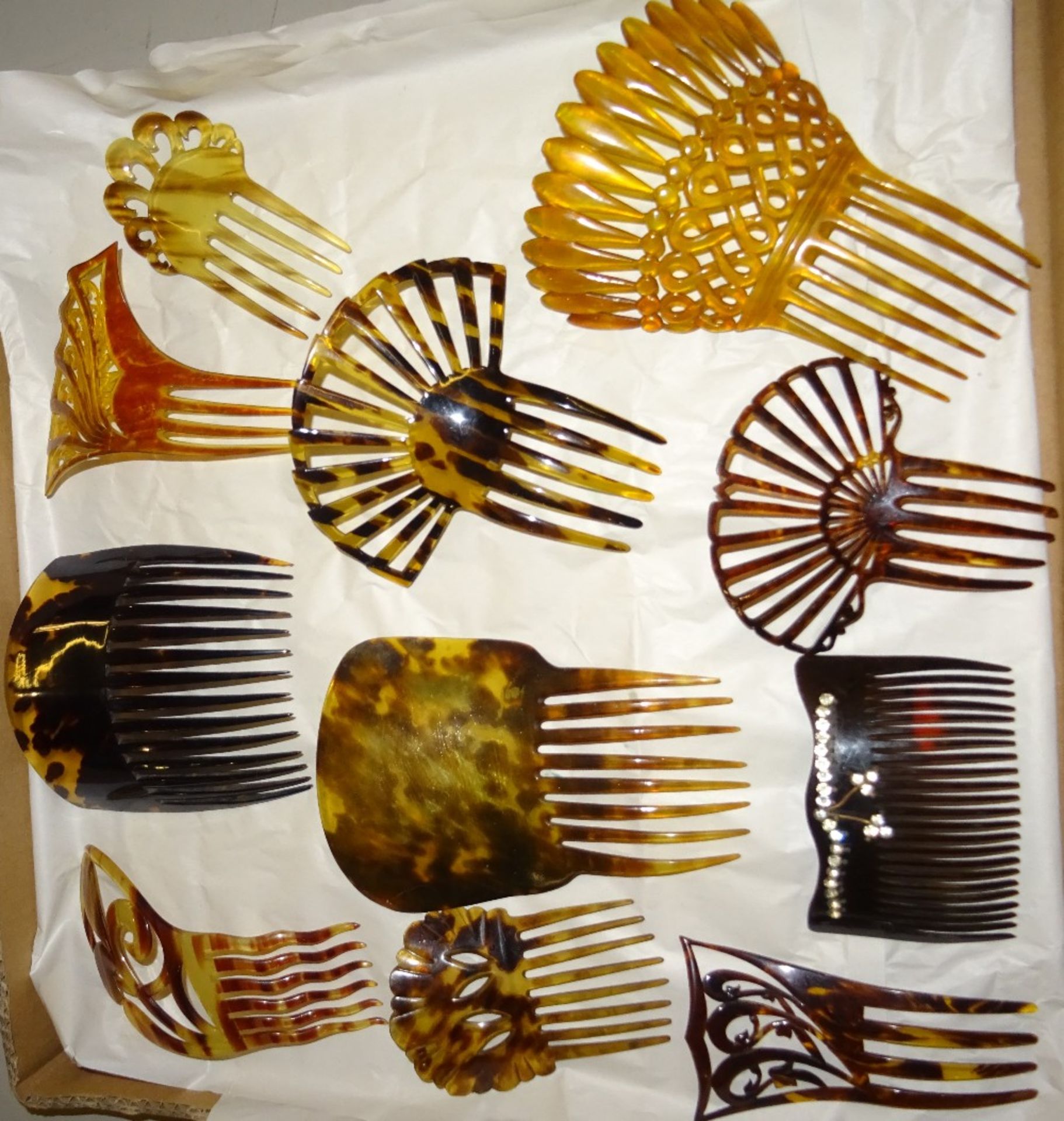 THREE OF 11 VINTAGE TORTOISHELL AND OTHER HAIR COMBS