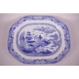 A large English pottery blue and white meat platter, 19" x 15½", A/F