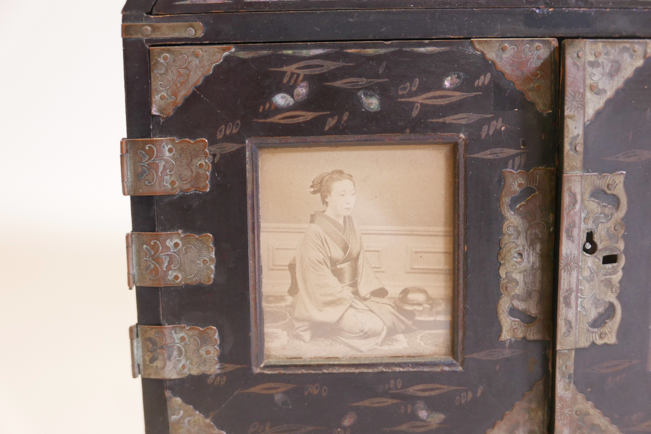 A Meiji lacquered table cabinet with gilt and mother of pearl inlaid decoration and metal mounts, - Image 2 of 5