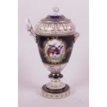 A porcelain pedestal urn and cover painted with panels of exotic birds with gilt embellishments,