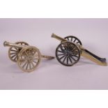 A pair of brass table cannon, 8½" long