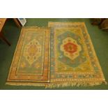 A Turkish all wool Oriental pattern carpet, 106" x 69", and another similar
