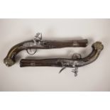 A pair of late C18th/early C19th Ottoman flintlock blunderbuss pistols with engraved decoration to