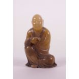 A Chinese amber soapstone carving of Shao Lao, 3" high