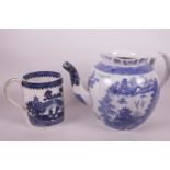 A large antique blue and white teapot decorated in the Oriental manner and bearing the name Mary