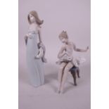 A Lladro porcelain figurine of a ballet dancer seated on a stool, 6¼" high, together with a Lladro