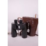 A pair of Bausch & Lomb binoculars, with a leather carry case, 8½" long