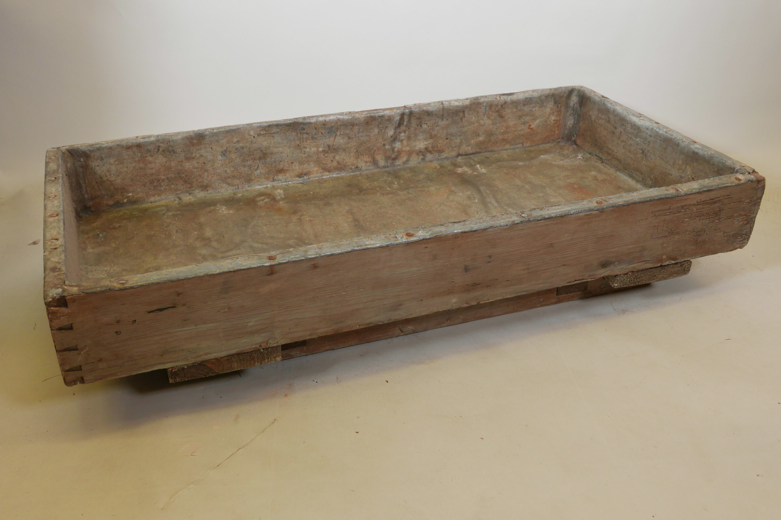 A vintage lead lined pine salting trough, 25" x 50½"