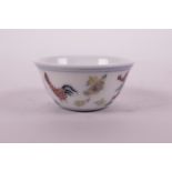 A small Chinese doucai porcelain tea bowl with chicken decoration, 6 character mark to base, 2½"