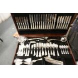 A mahogany canteen containing a large quantity of silver plated King's pattern cutlery