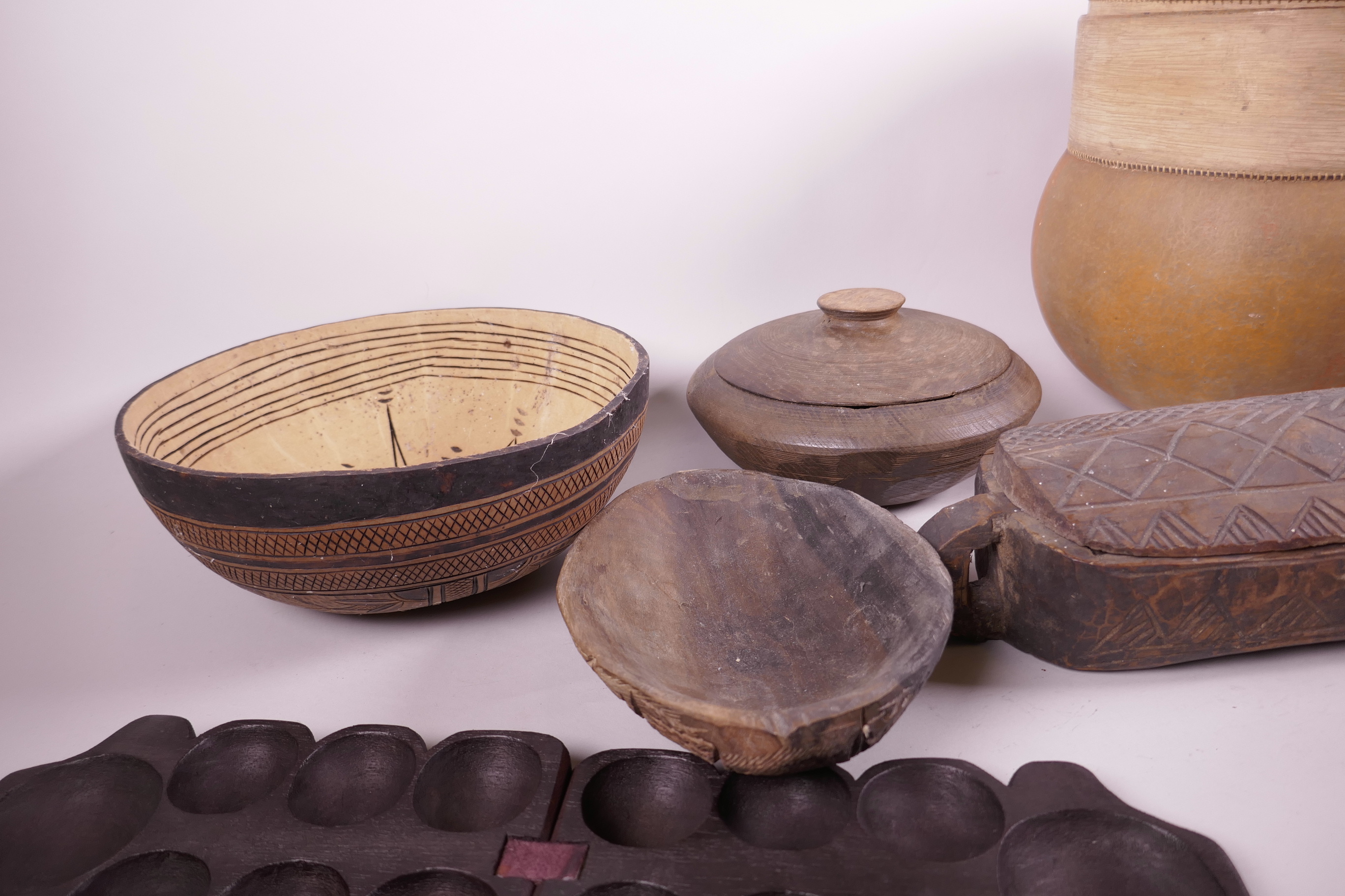 A quantity of African tribal wood and gourd vessels and containers, largest 13" high - Image 4 of 4