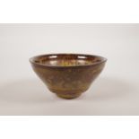 A Chinese Cizhou tortoiseshell glazed pottery rice bowl, 5" diameter