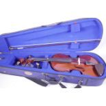 The 'Stentor Student 1' violin and bow with accessories in a fitted box