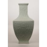 A Chinese celadon glazed porcelain vase with archaic style decoration, impressed seal mark to