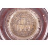 An antique circular wax seal depicting a castle and Latin inscription, 3½" diameter, in a circular