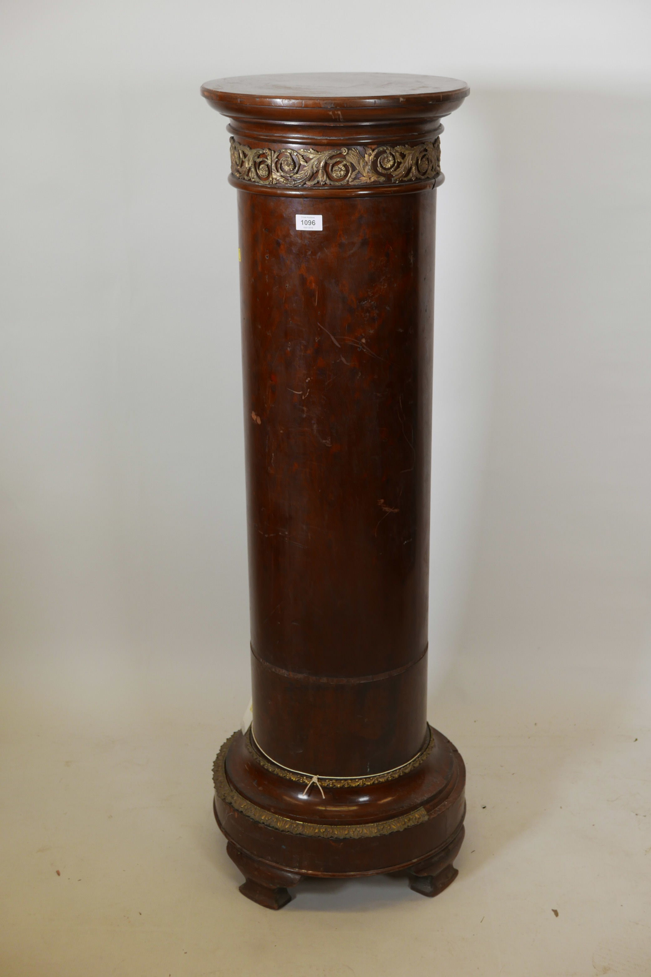 A mahogany and brass mounted pedestal, ex British Museum, 51½" high, 16" diameter