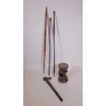 A collection of ethnographic items to include a carved wood stool, spears, staffs etc, 52" longest
