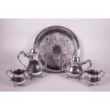 A five piece silver plated tea set including a circular tray, 14½" diameter