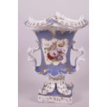 A C19th Staffordshire Rockingham style pedestal urn with two scroll handles and leaf column, hand