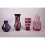 A cut ruby glass vase and three other coloured glass vases, largest 10½" high