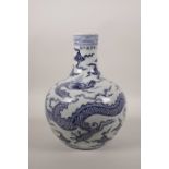 A Chinese blue and white pottery vase with dragon decoration, 6 character mark to side, 11" high