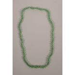 A string of apple jade beads, 27" long