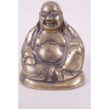 A cast brass figurine of Buddha seated in meditation, 4½" high