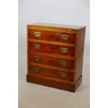 A yew wood veneered bachelor's chest, with military style handles, 24" x 12" x 28"