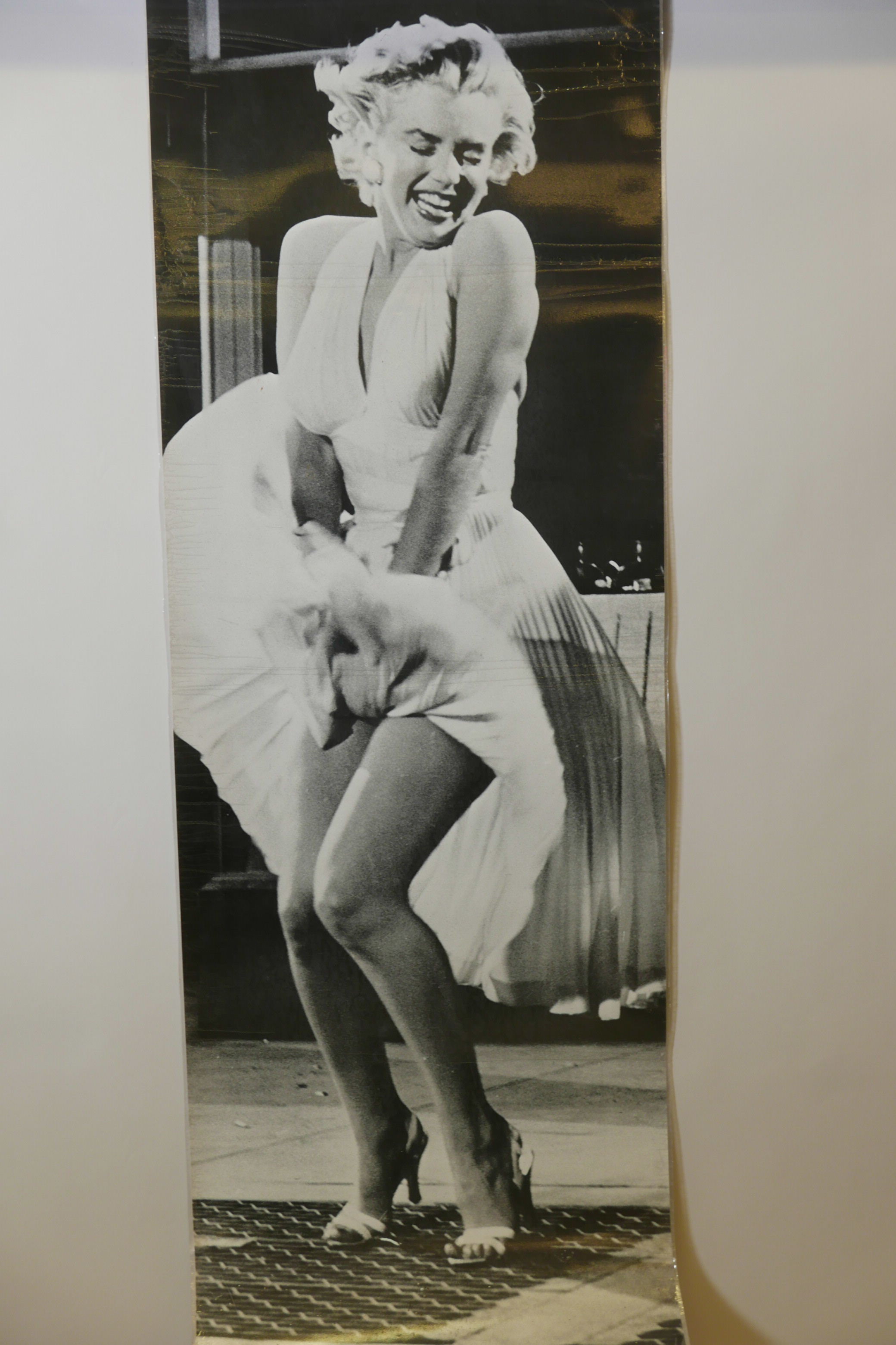 A laminated full size photographic poster of Marilyn Monroe, from the 1954 film The Seven Year Itch,