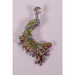 An Art Nouveau silver and plique-à-jour brooch in the form of a peacock, 2½"