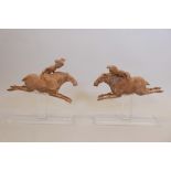 A pair of Chinese terracotta figures of female polo players, 15" long, minor repairs