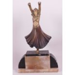 After F Priess, an Art Deco style bronzed metal figurine of a dancer, with ceramic head and torso,