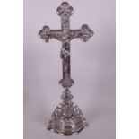 A white metal table crucifix, 15½" high