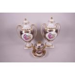A pair of Spode china pedestal handled lidded urns decorated with flowers, 11" high, and a Spode