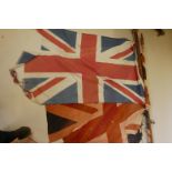 Two very tired Union Flags on wood marine flag poles, 54" x 30"