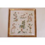 A crewel work embroidery with naive decoration of exotic animals, a bird and flora, 20" x 21"