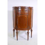 A Louis XV style inlaid walnut demi-lune cabinet with single drawer and cupboard, and rouge marble