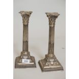 A pair of Corinthian column Sheffield silver plate candlesticks, 11½" high