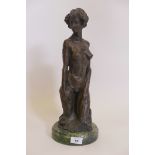 A bronze figure, female nude study, signed indistinctly, mounted on a marble base, 17" high