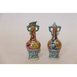 A pair of Oriental porcelain vases with gilt and enamel dragon decoration, A/F, repairs and