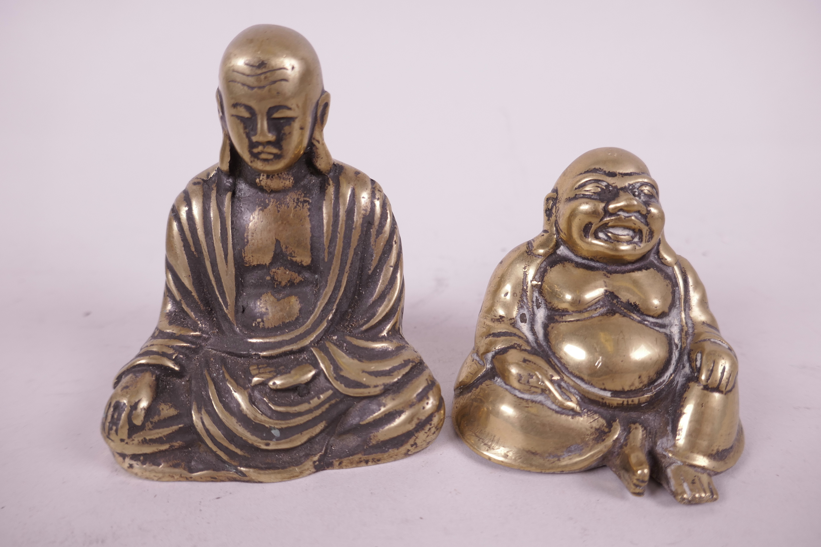 Two heavy cast brass figurines of Buddha seated in meditation, largest 3¼" high