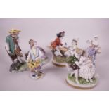 A pair of Dresden porcelain figurines of market vendors, 5½" high, an Unterweissbach figure group of