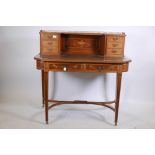 A Victorian inlaid mahogany bonheur du jour, with three quarter pierced brass gallery and inset