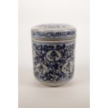 A Chinese blue and white pottery trinket pot and cover with all over auspicious character