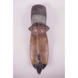 An African tribal carved and painted hardwood wall mask, 14½" long