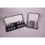 A silver plated twelve piece boxed teaspoon set, together with a set of six silver plated butter