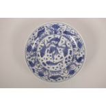 A Chinese blue and white porcelain dish decorated with carp in a lotus pond, 6 character mark to