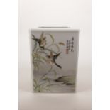 A Chinese square form porcelain brush pot with famille verte enamel decoration depicting waterfowl