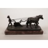 A bronze figure group of a horse drawn ploughing team, signed Andre, 9" long